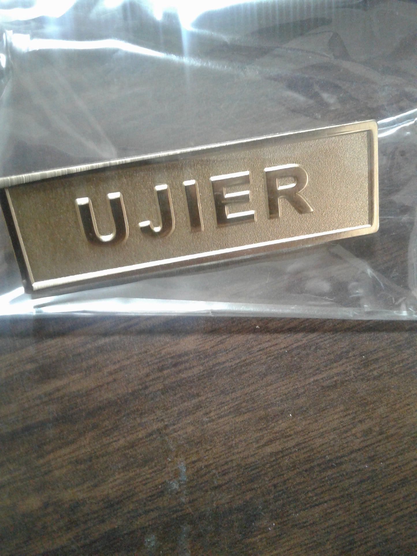 Badge Ujier — available at The Gospel Bookstore