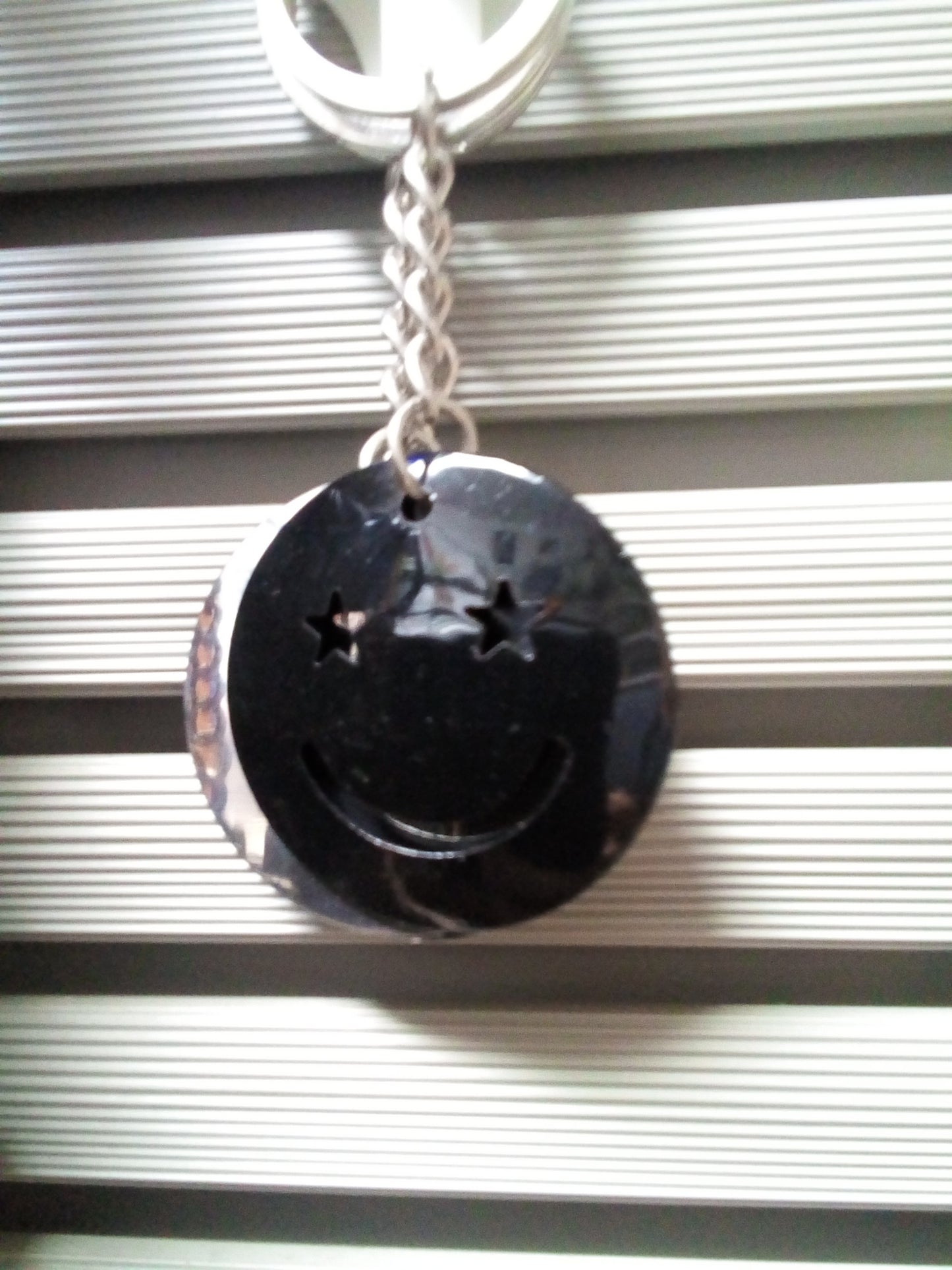 Smiley face keychain — available at The Gospel Bookstore