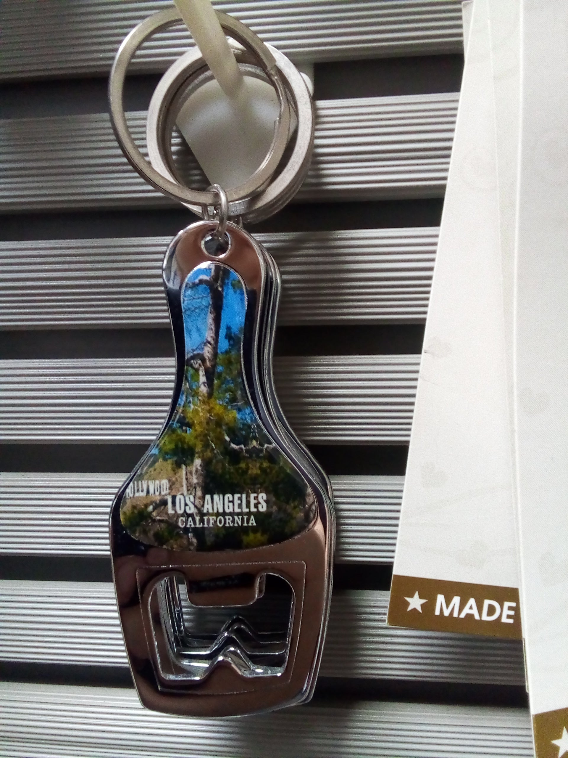 Bottle opener keychain — available at The Gospel Bookstore