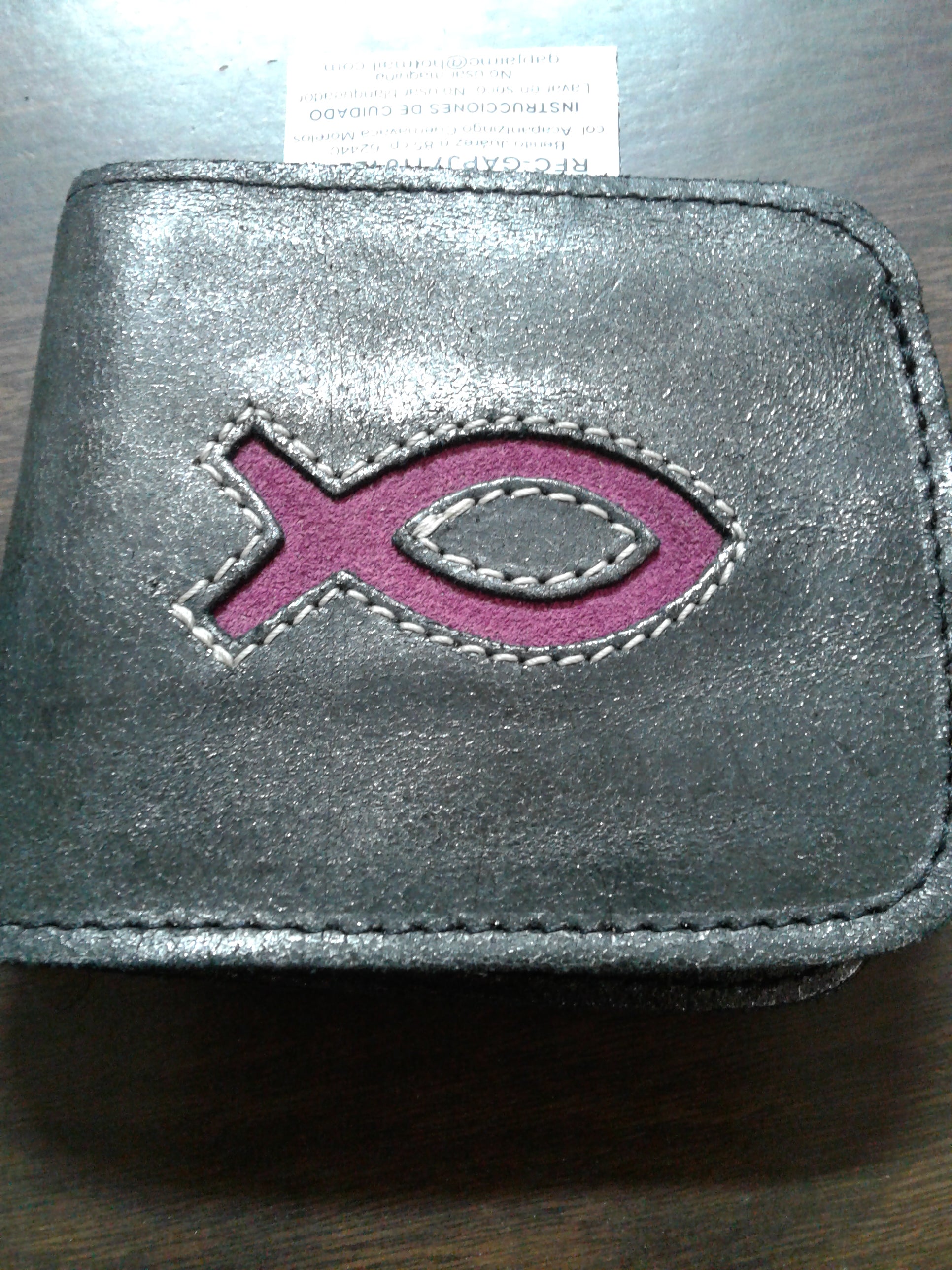 Leather wallet — available at The Gospel Bookstore