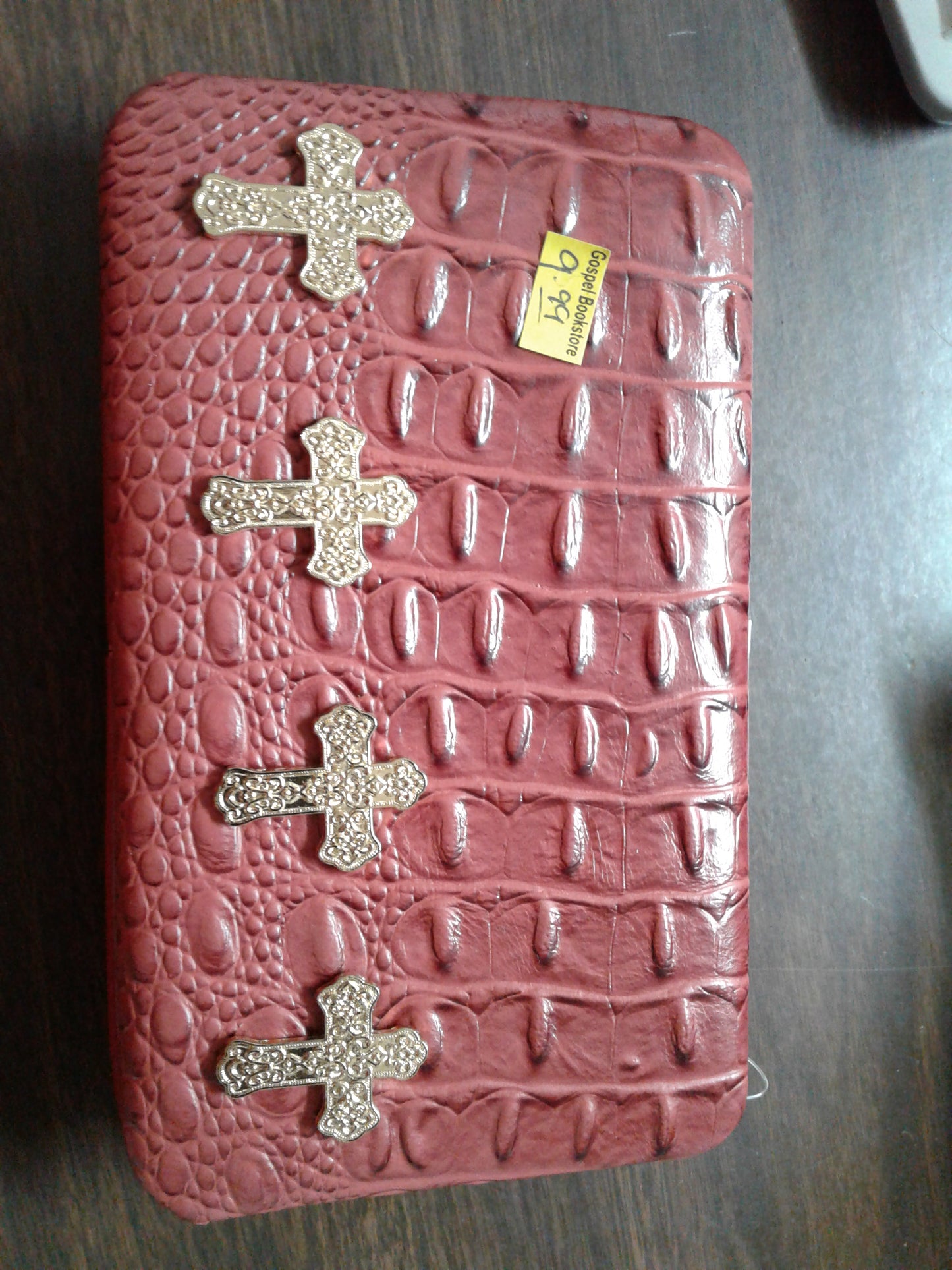Red wallet — available at The Gospel Bookstore