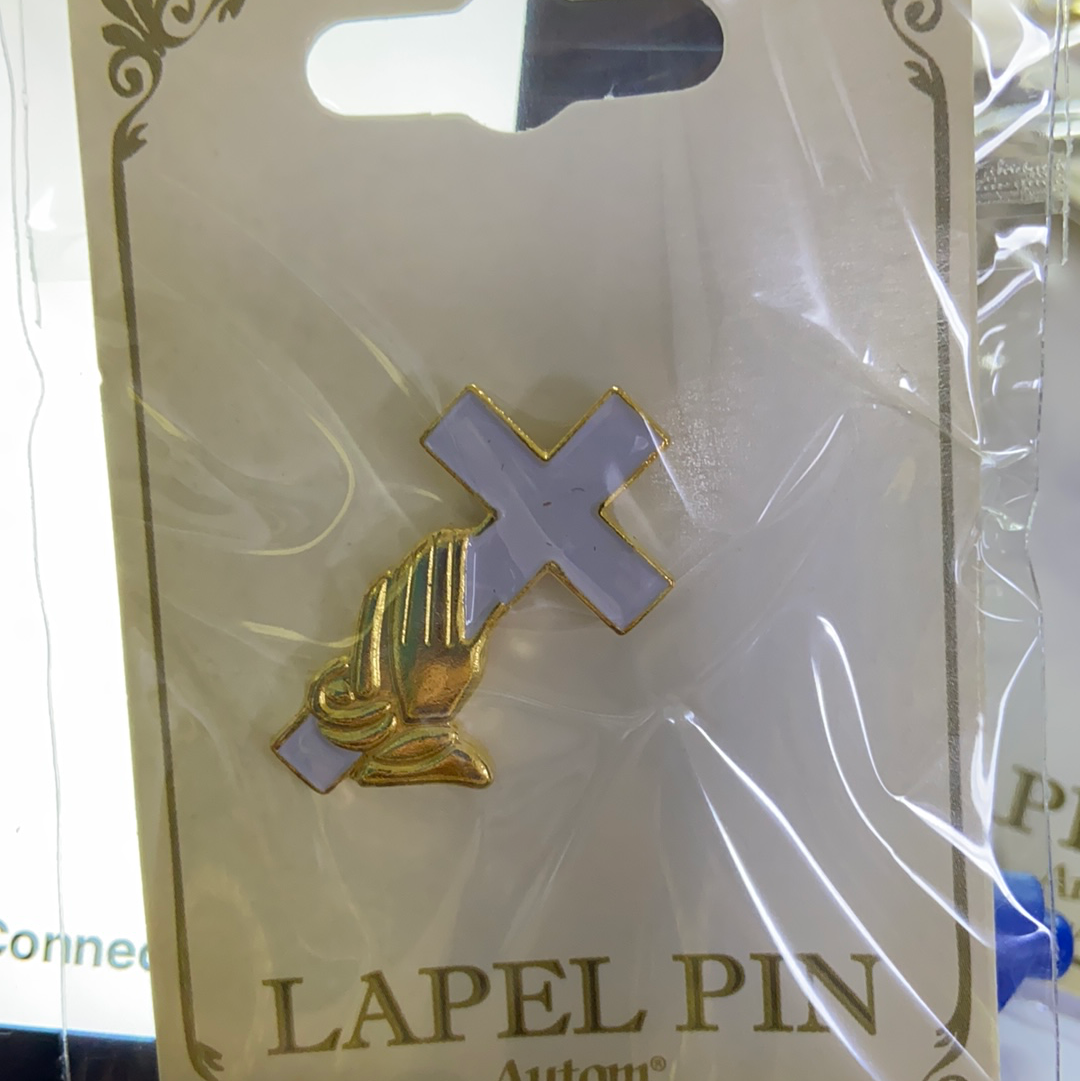 Cross manos pin — available at The Gospel Bookstore