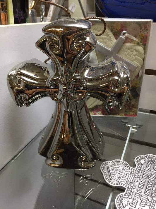 Metal cross — available at The Gospel Bookstore